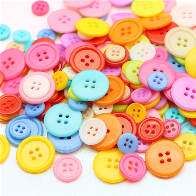 Plastic Plastic colored four eye button round