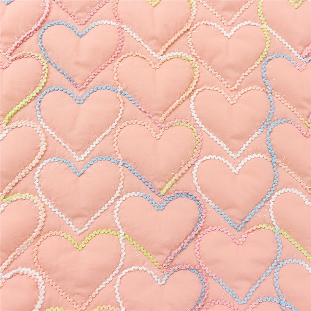 embroidered heart quilted fabric