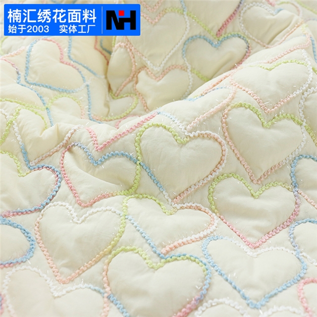 embroidered heart quilted fabric