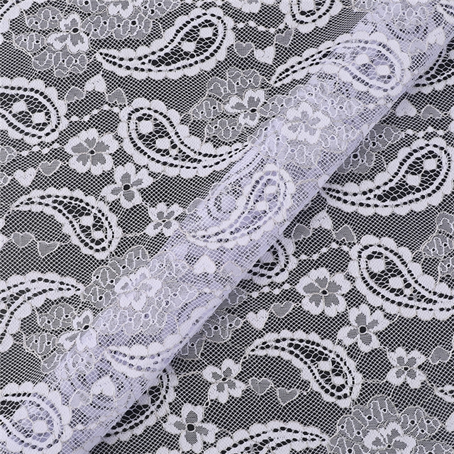 100% polyester cashew patterned hollow lace fabric