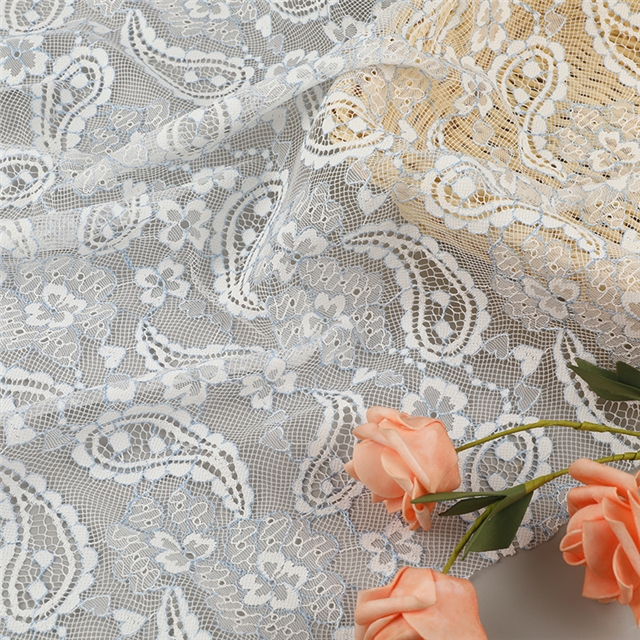 100% polyester cashew patterned hollow lace fabric
