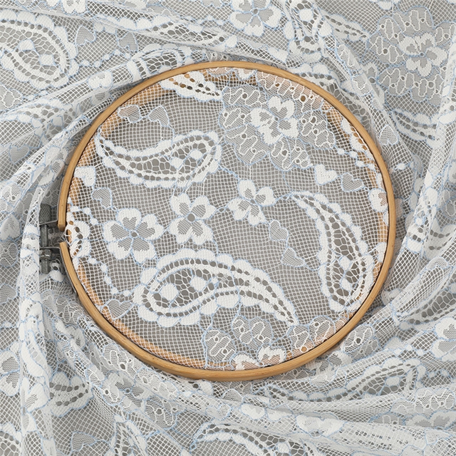 100% polyester cashew patterned hollow lace fabric