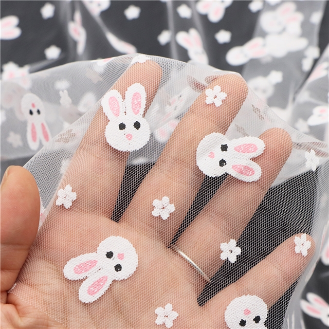 offset flower rabbit head mesh fabric