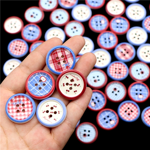 grid patterned red blue heart-shaped apple round button