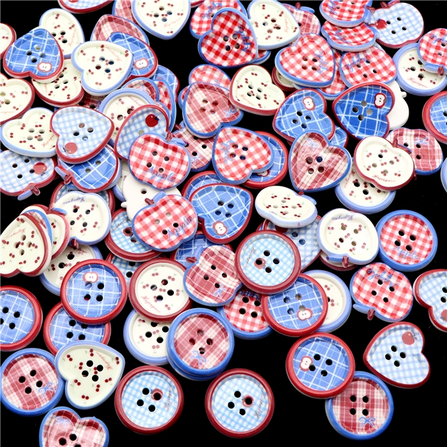 grid patterned red blue heart-shaped apple round button