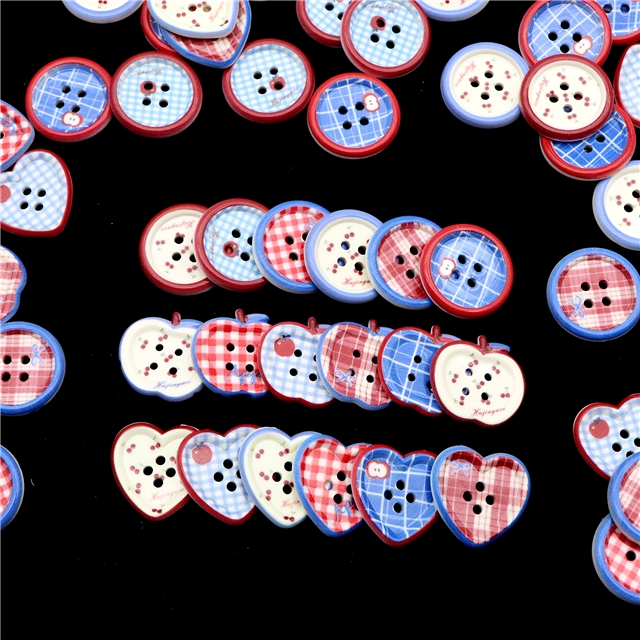 grid patterned red blue heart-shaped apple round button