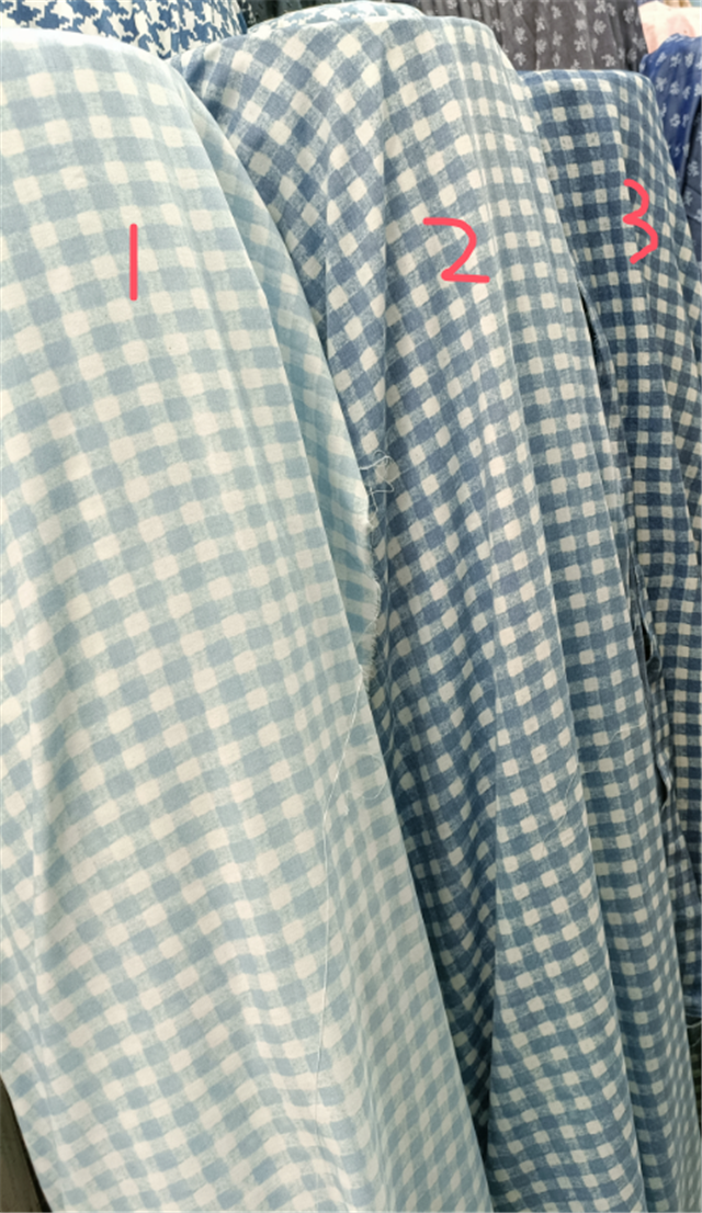 blue colored woven checkered fabric