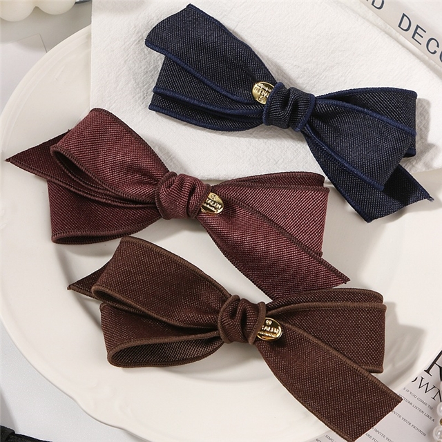 thick solid color woven tape with diagonal edge pressing