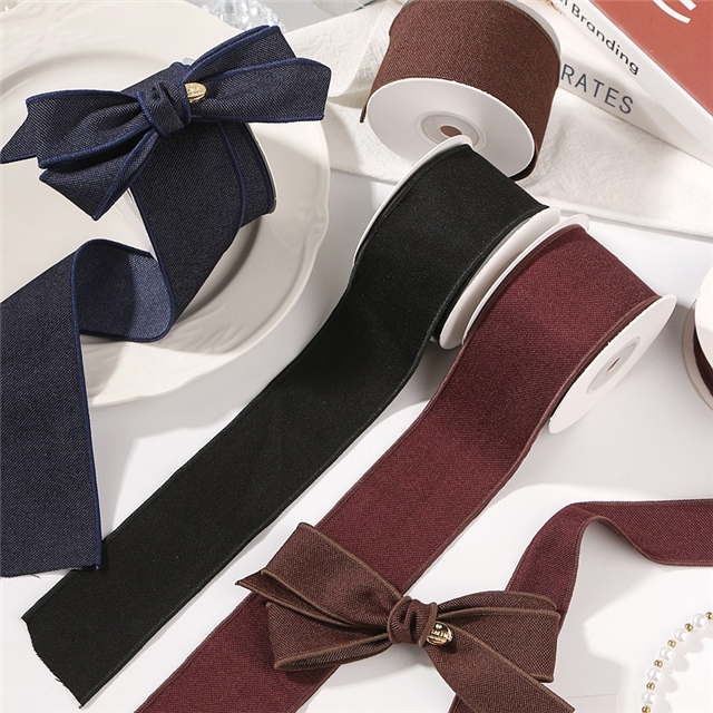 thick solid color woven tape with diagonal edge pressing