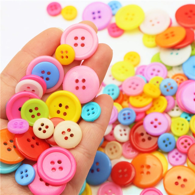 Plastic Plastic colored four eye button round