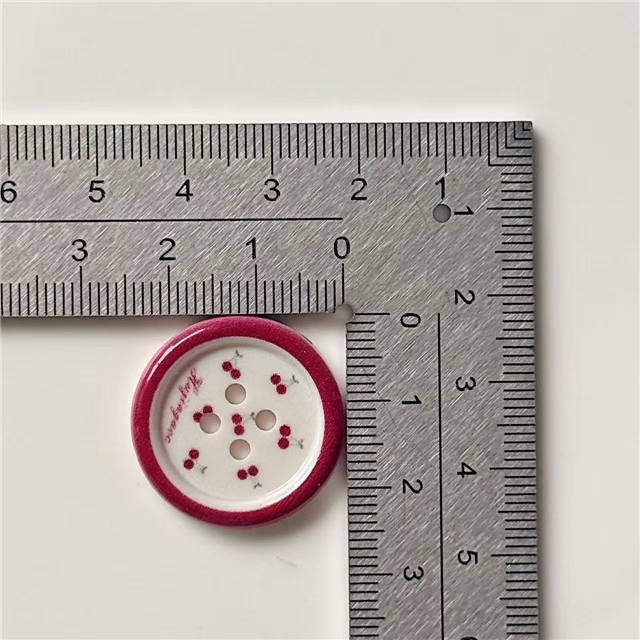 grid patterned red blue heart-shaped apple round button