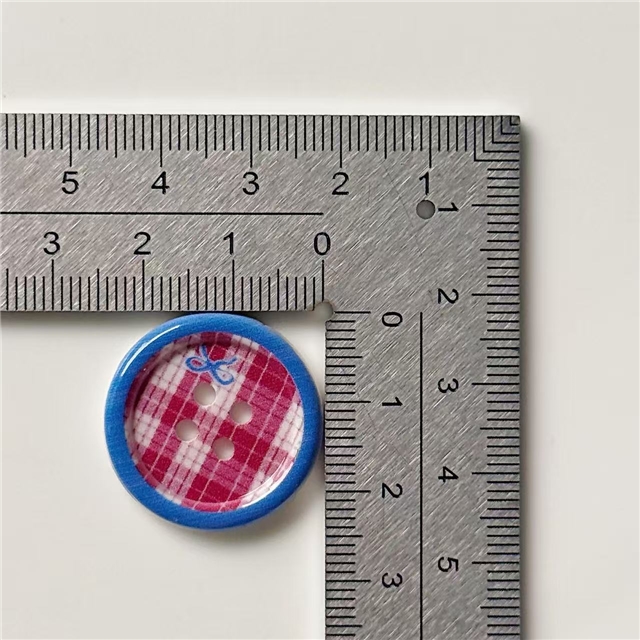 grid patterned red blue heart-shaped apple round button