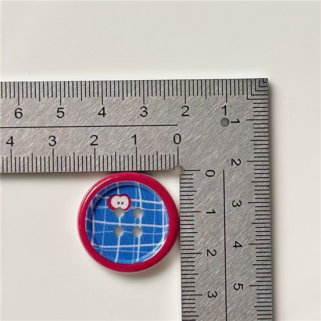 grid patterned red blue heart-shaped apple round button