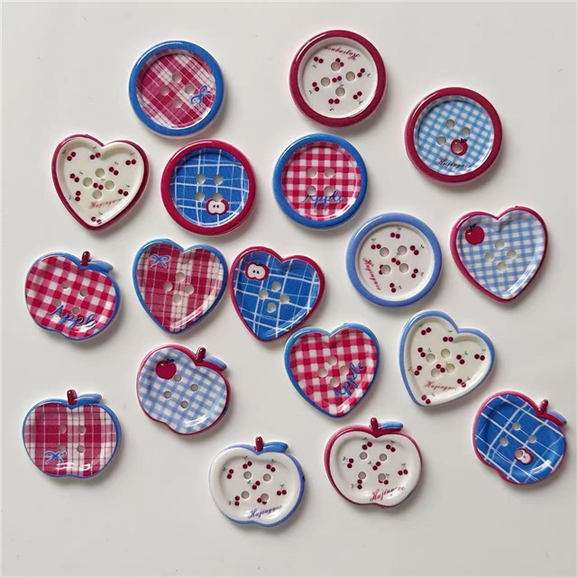 grid patterned red blue heart-shaped apple round button