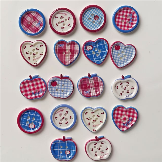 grid patterned red blue heart-shaped apple round button
