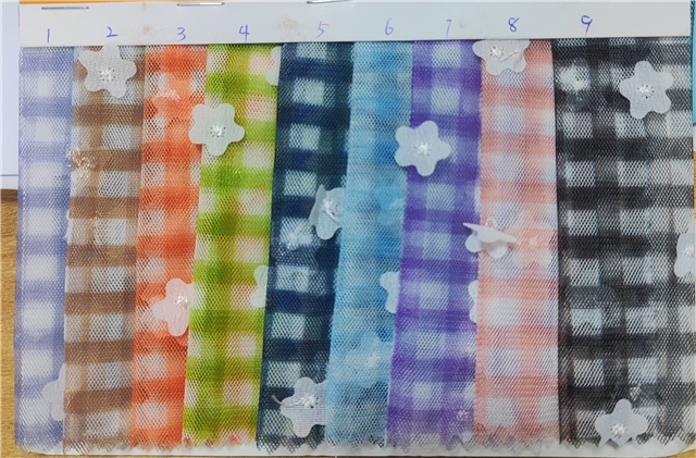 three dimensional flower printed checkered mesh fabric