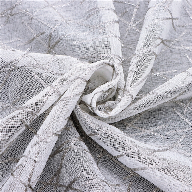 silver thread embroidery with cross patterned polyester fabric