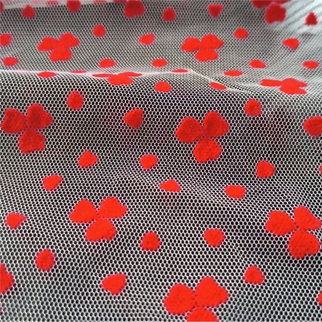 90% nylon and 10% spandex velvet red three petal flower heart mesh fabric
