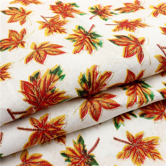 spraying powder on autumn leaves imitating linen cloth