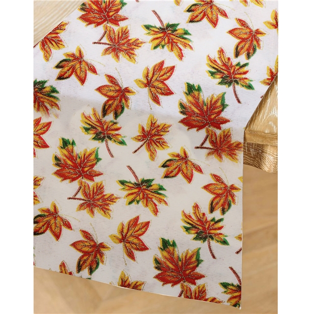 spraying powder on autumn leaves imitating linen cloth