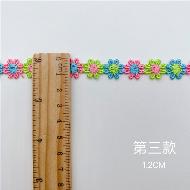 colorful daisy embroidery with water-soluble lace