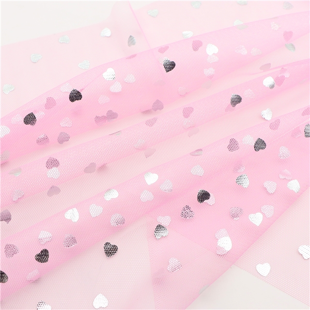 100% polyester silver hot stamping heart mesh fabric