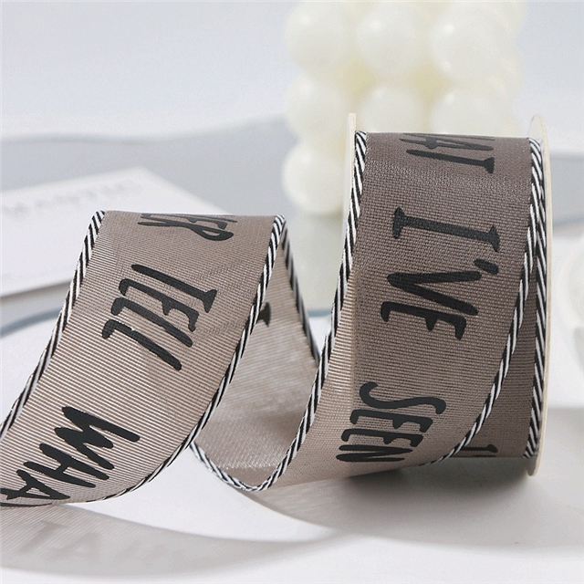 single sided letter printed black and white diagonal edge woven tape