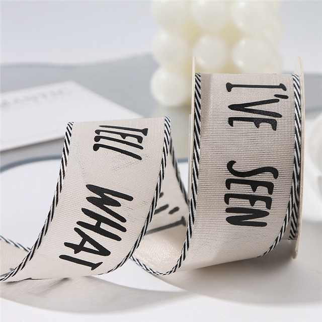 single sided letter printed black and white diagonal edge woven tape