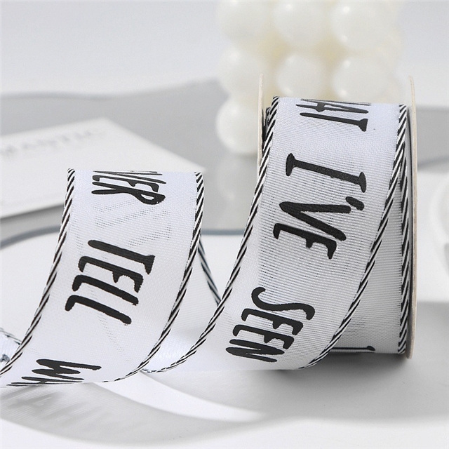 single sided letter printed black and white diagonal edge woven tape