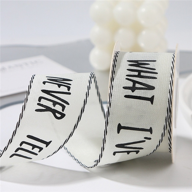 single sided letter printed black and white diagonal edge woven tape
