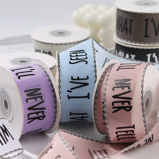 single sided letter printed black and white diagonal edge woven tape